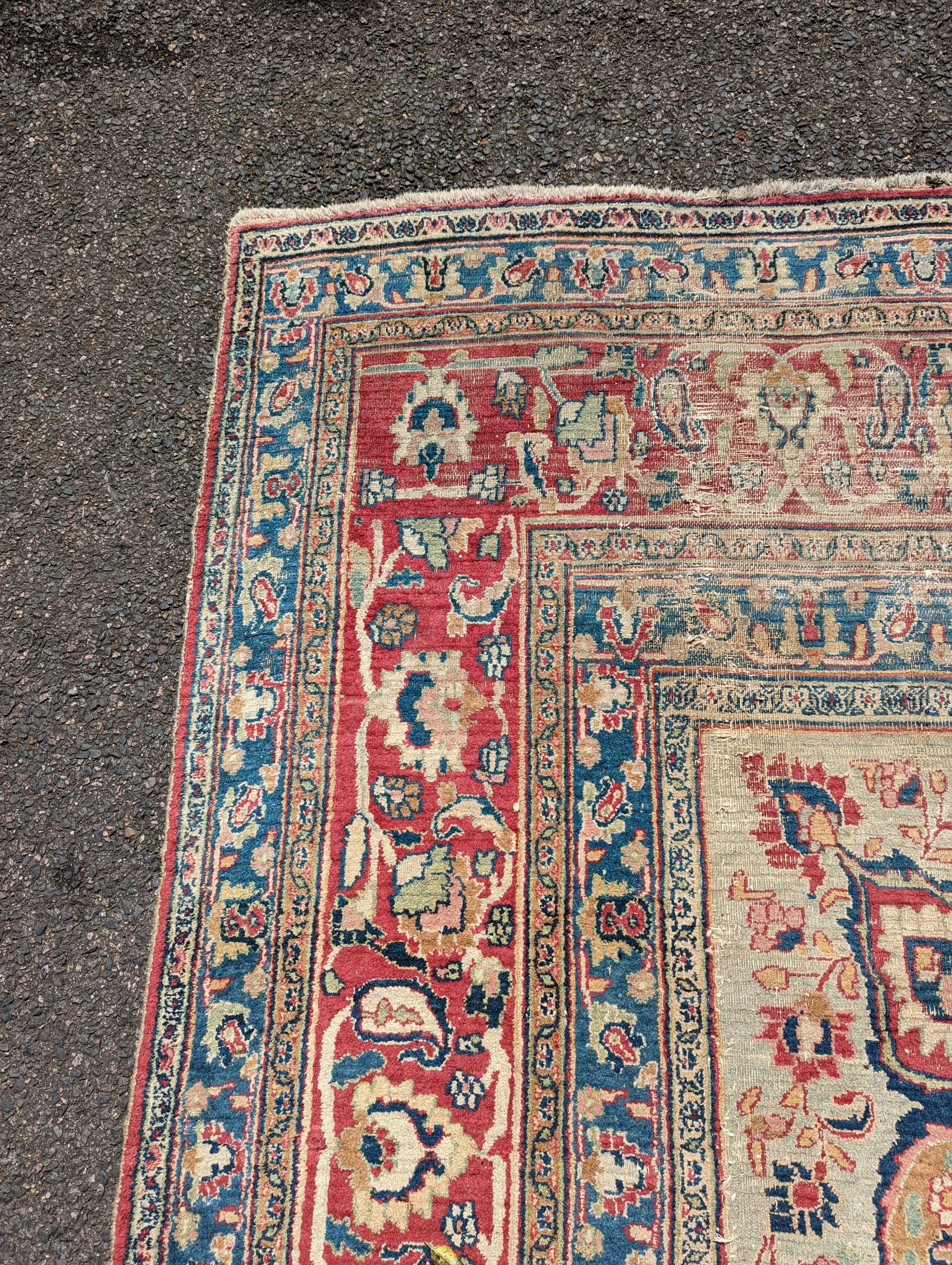 An Isfahan ivory ground carpet, 432 x 330cm
